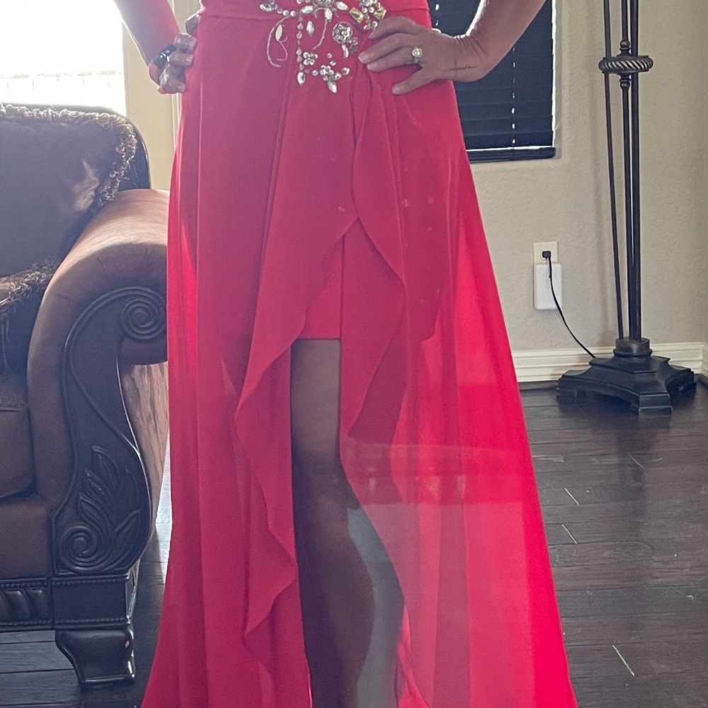 Red, strapless, beaded dress.